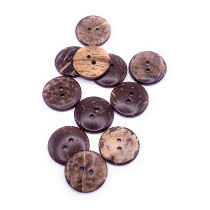 Pile of brown coconut buttons.