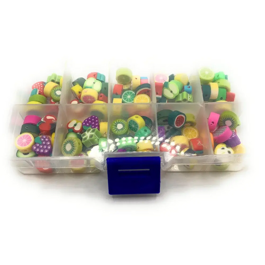 Compartmentalized box of fruit-shaped erasers.