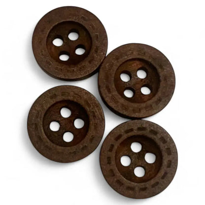 Four brown wooden buttons.