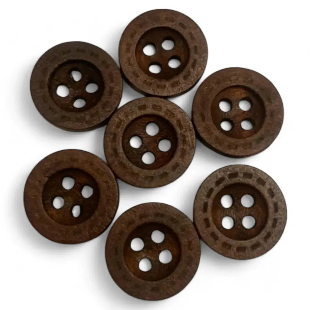 Seven brown, round, four-hole wooden buttons.