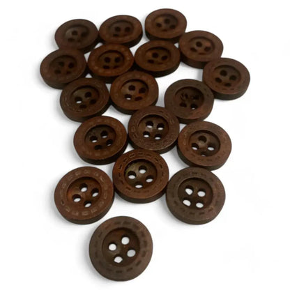 Pile of brown wooden buttons.