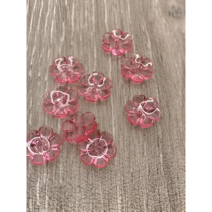 Pink flower-shaped buttons.