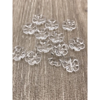 Clear flower-shaped buttons.