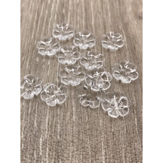Clear flower-shaped buttons.