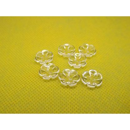Translucent flower-shaped bead caps.