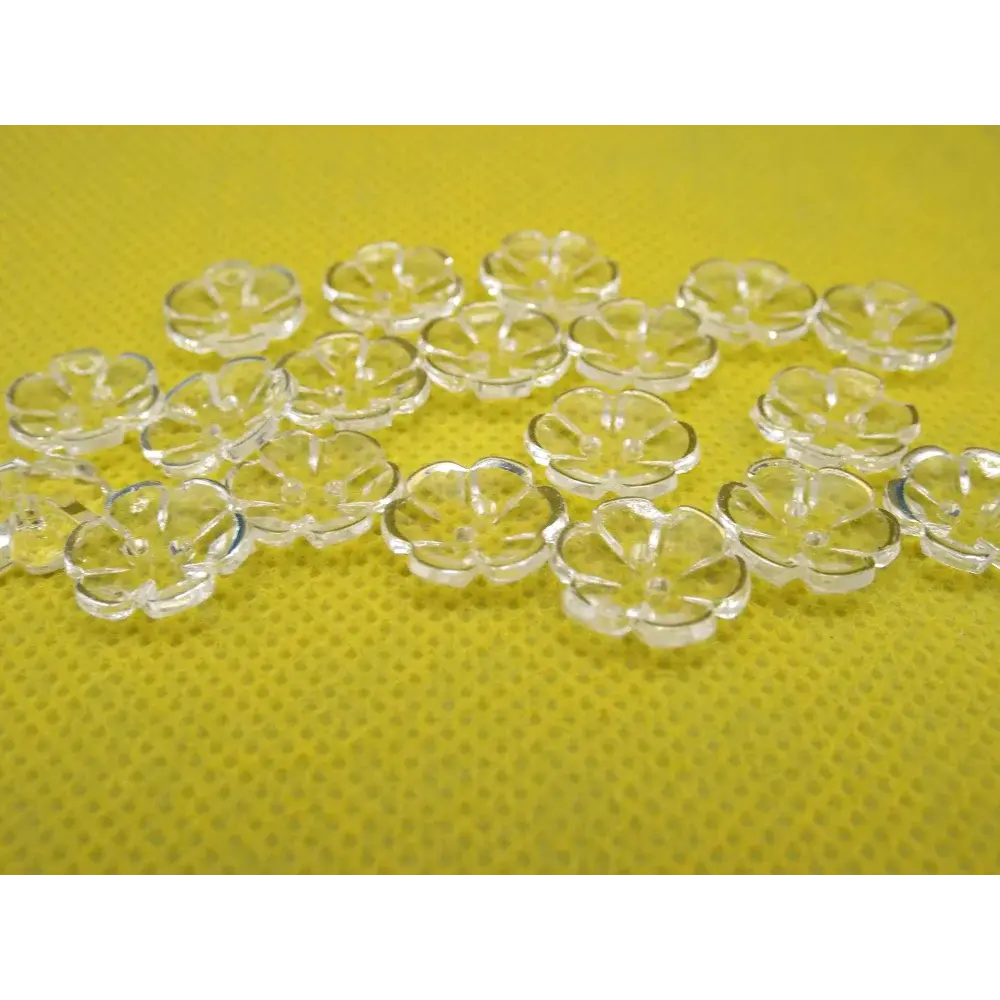 Clear flower-shaped buttons.