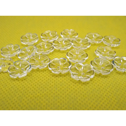 Clear flower-shaped buttons.