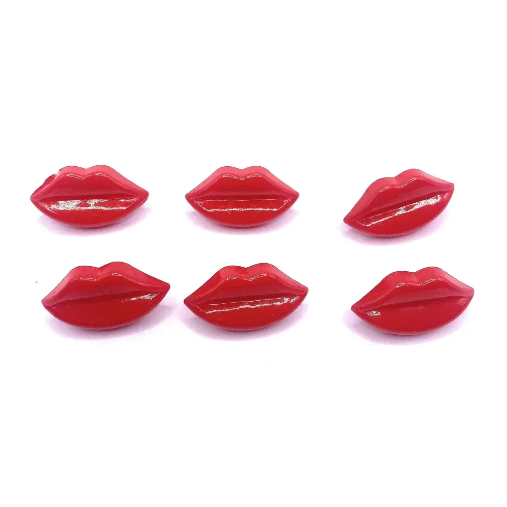 Six glossy red lip-shaped buttons.
