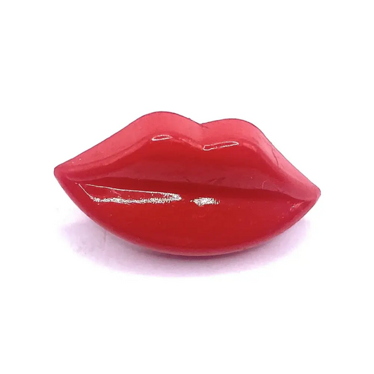 Glossy red lips.