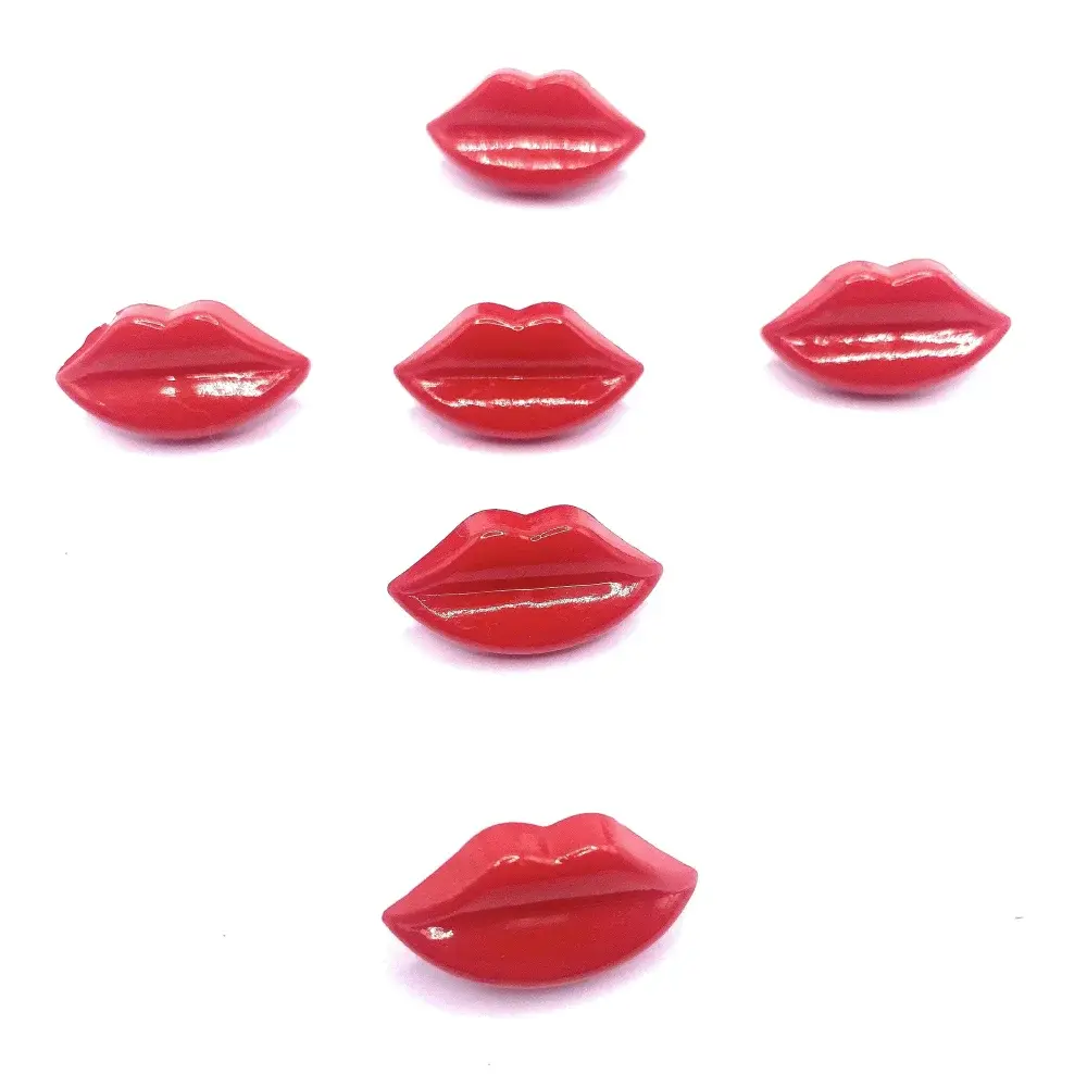 Red glossy lip-shaped objects.