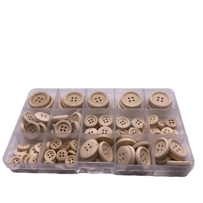 Assorted wooden sewing buttons in a plastic organizer.