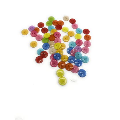 Colorful assortment of round buttons.