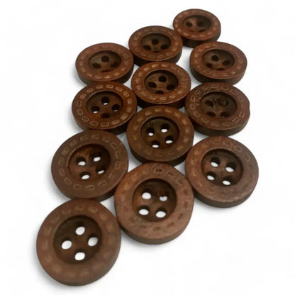 Brown, round, four-hole buttons.