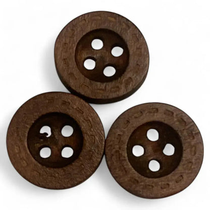 Three brown wooden four-hole buttons.