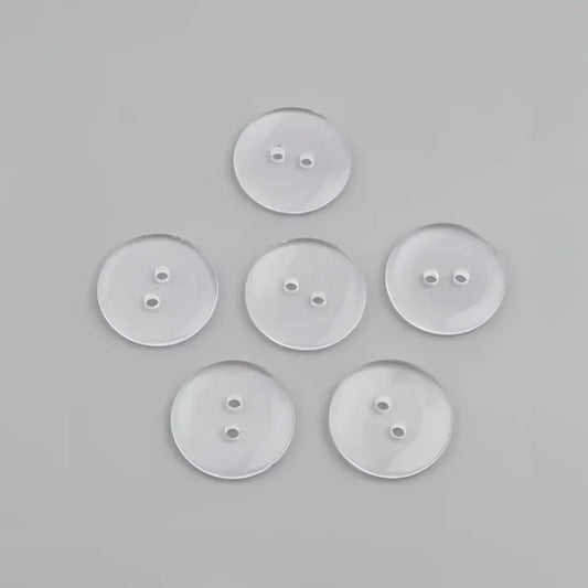Translucent two-hole buttons.