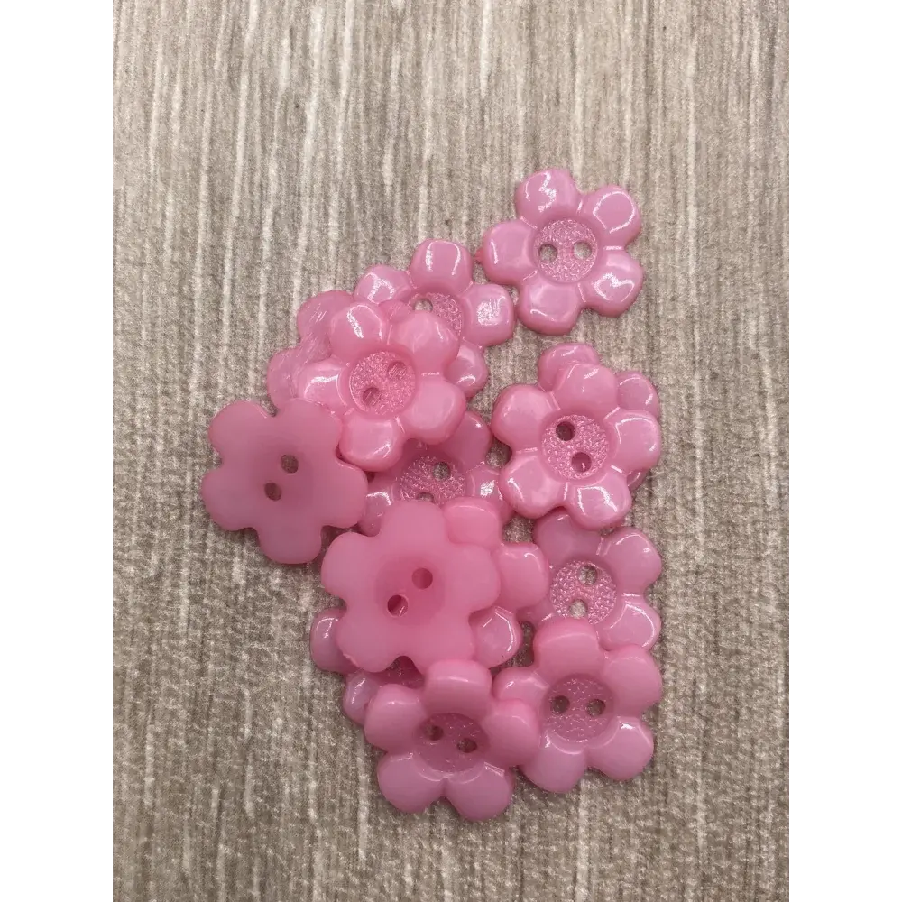 Pink flower-shaped buttons.