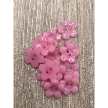 Pink flower-shaped buttons.