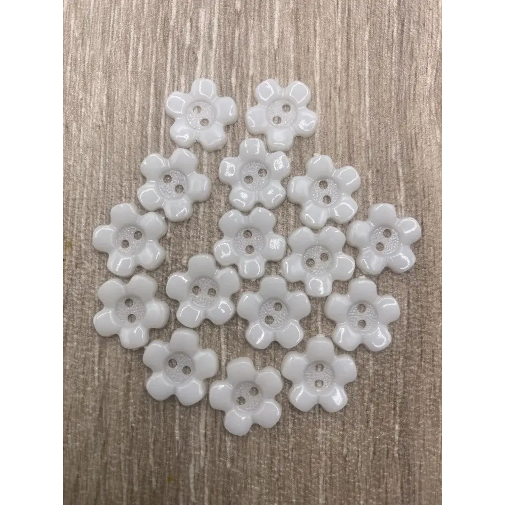 White flower-shaped buttons.