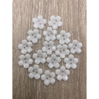 White flower-shaped buttons.