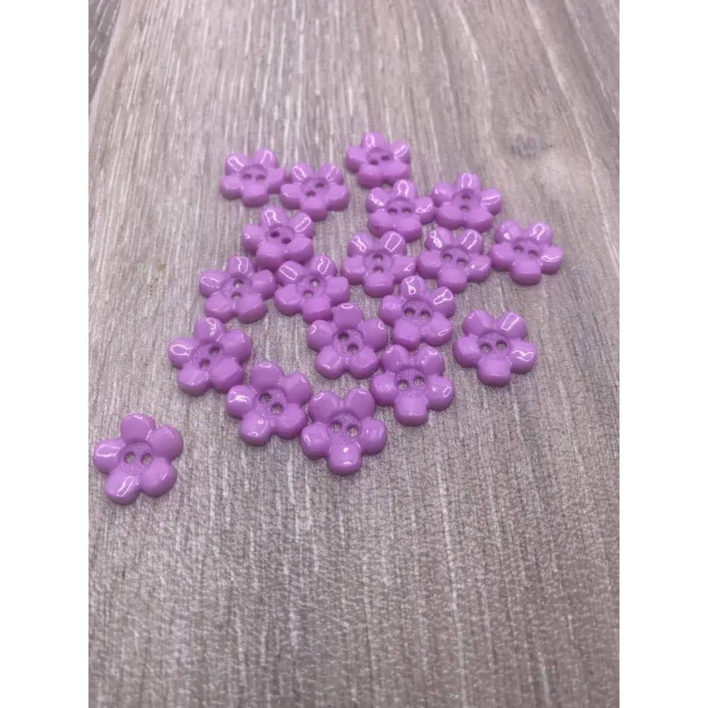 Purple flower-shaped buttons.