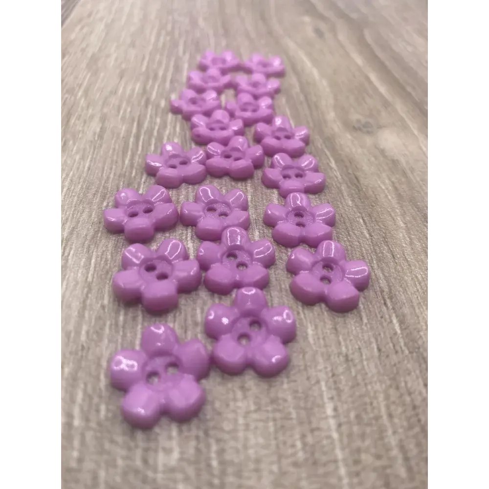 Purple flower-shaped buttons.