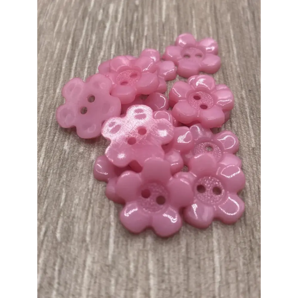 Pink flower-shaped buttons.