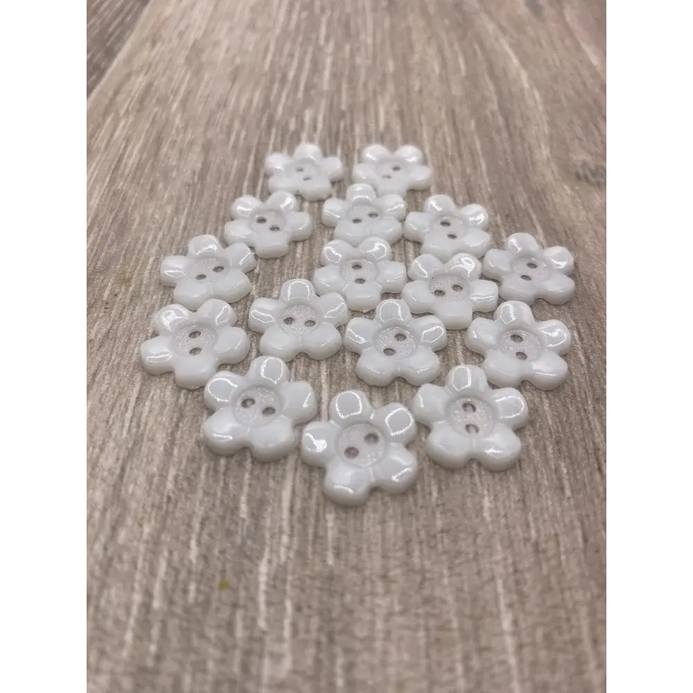 White flower-shaped buttons.