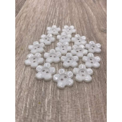 White flower-shaped buttons.