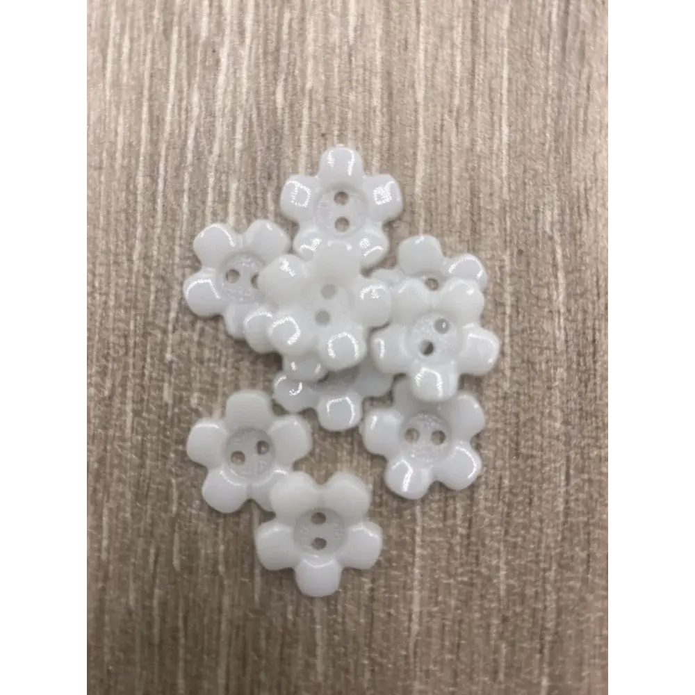 White flower-shaped buttons.