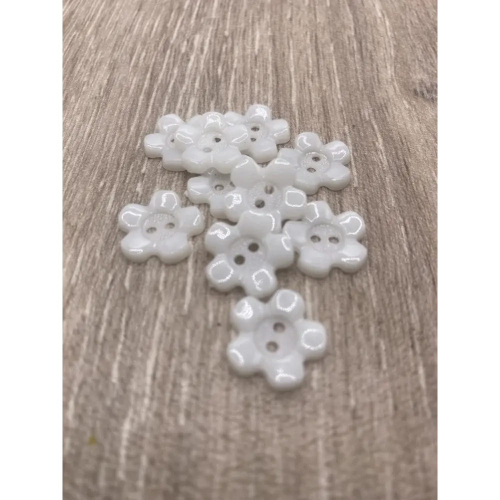 White flower-shaped buttons.