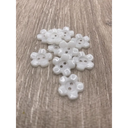 White flower-shaped buttons.