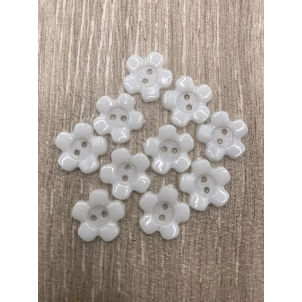 White flower-shaped buttons.