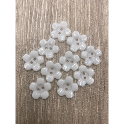 White flower-shaped buttons.