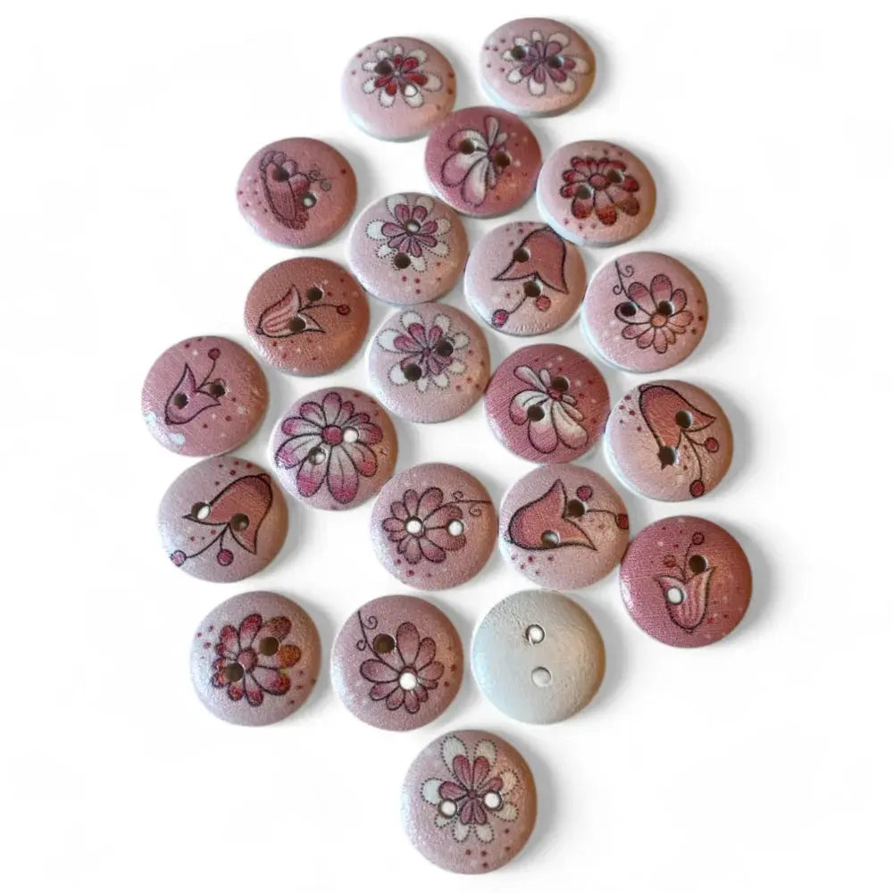 Round, pink, floral-patterned wooden buttons.