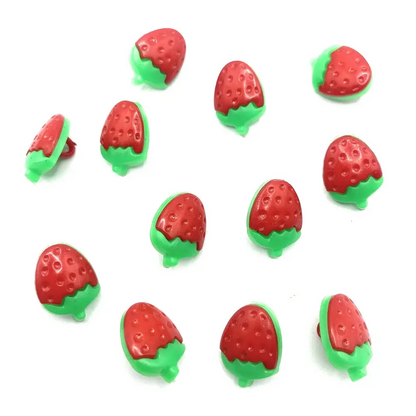 Strawberry-shaped plastic buttons.