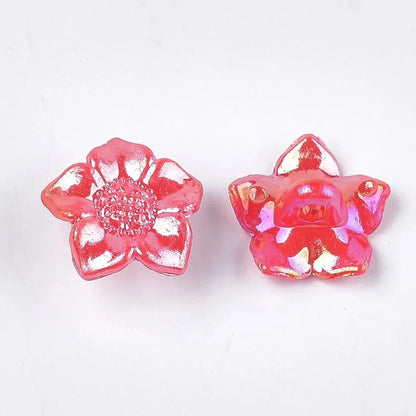 Two iridescent pink flower beads.