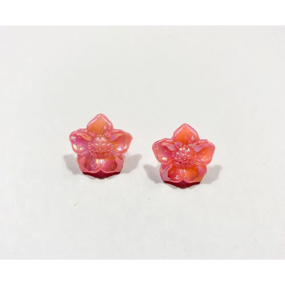 Pair of pink flower earrings.