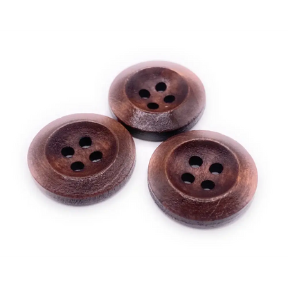 Three brown wooden four-hole buttons.