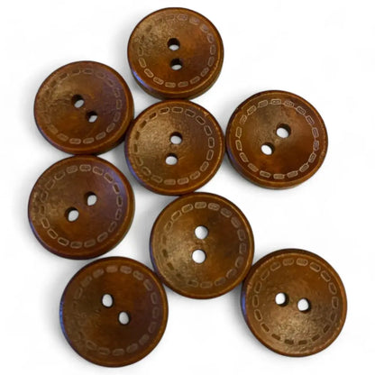 Brown two-hole buttons with decorative stitching.