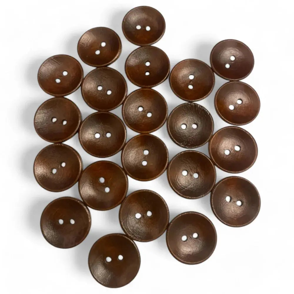 Pile of brown, two-hole buttons.