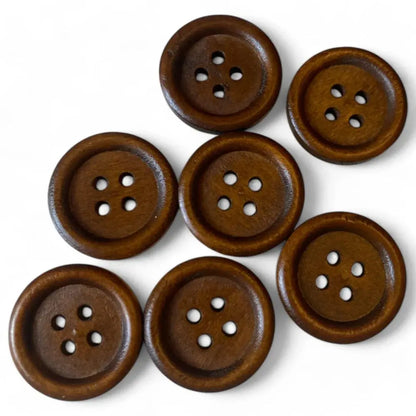 Seven brown, four-hole wooden buttons.