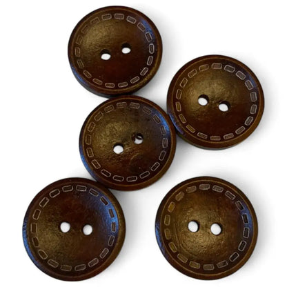 Five brown wooden sewing buttons.