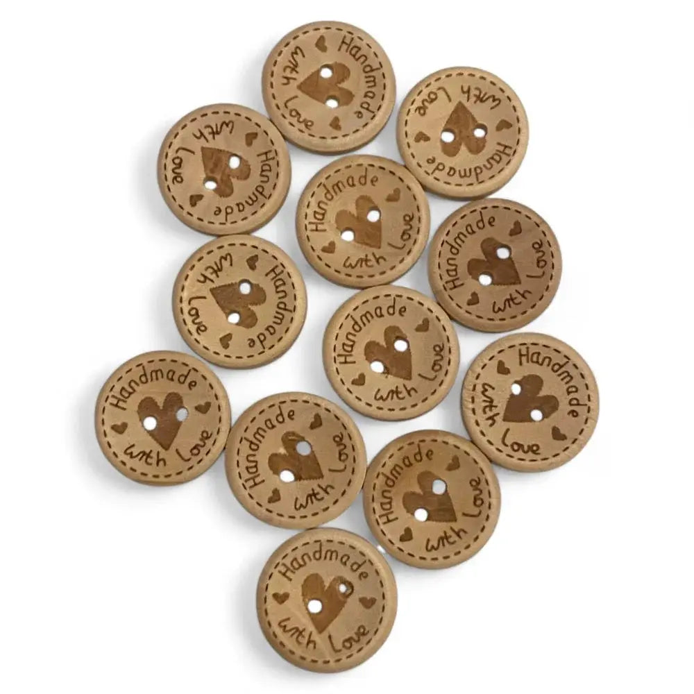 Round, brown, wooden buttons with heart-shaped holes.