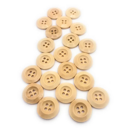 Pile of four-hole wooden buttons.