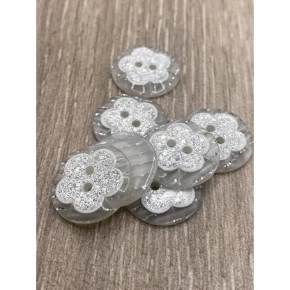 Sparkly flower-shaped buttons.