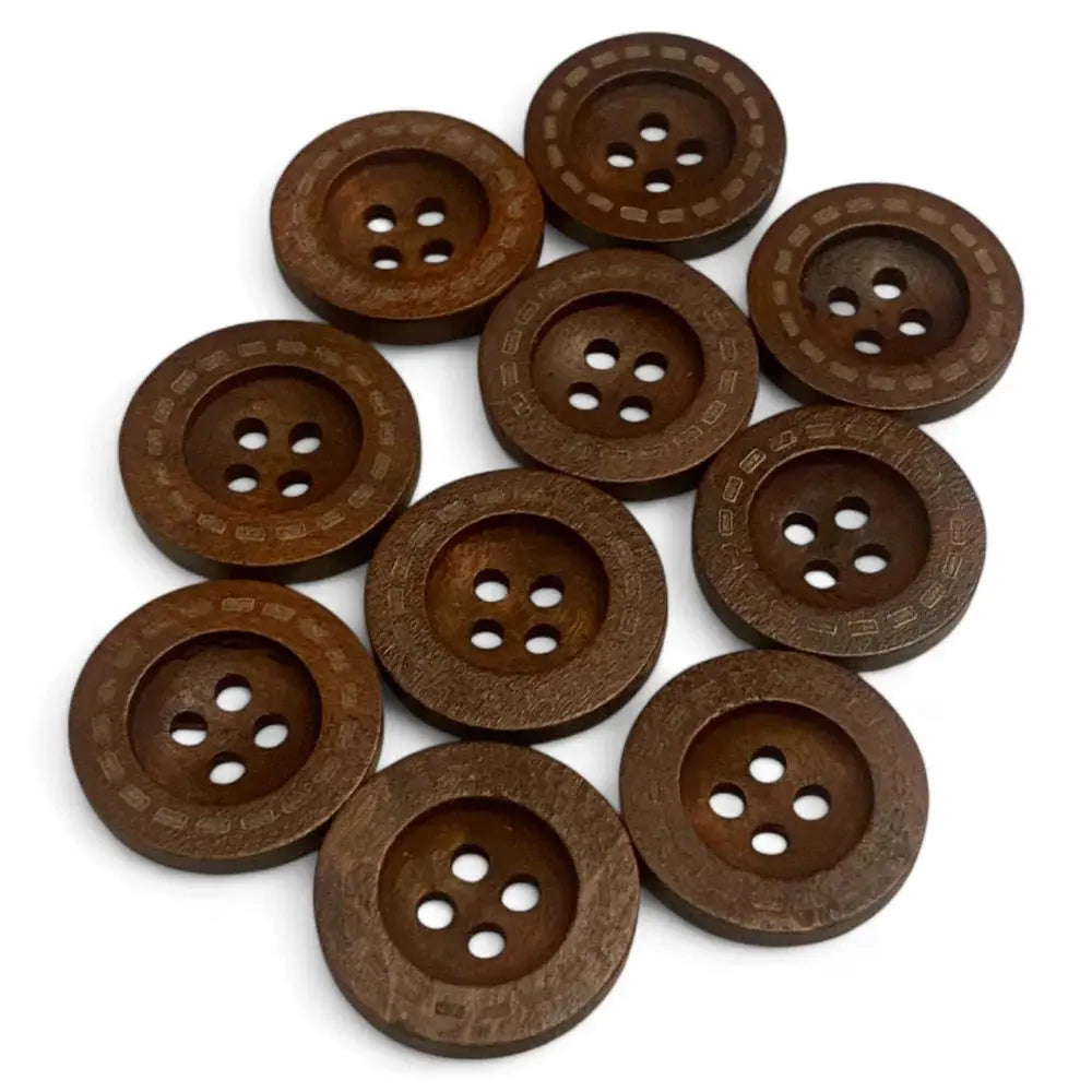 Pile of brown wooden buttons.