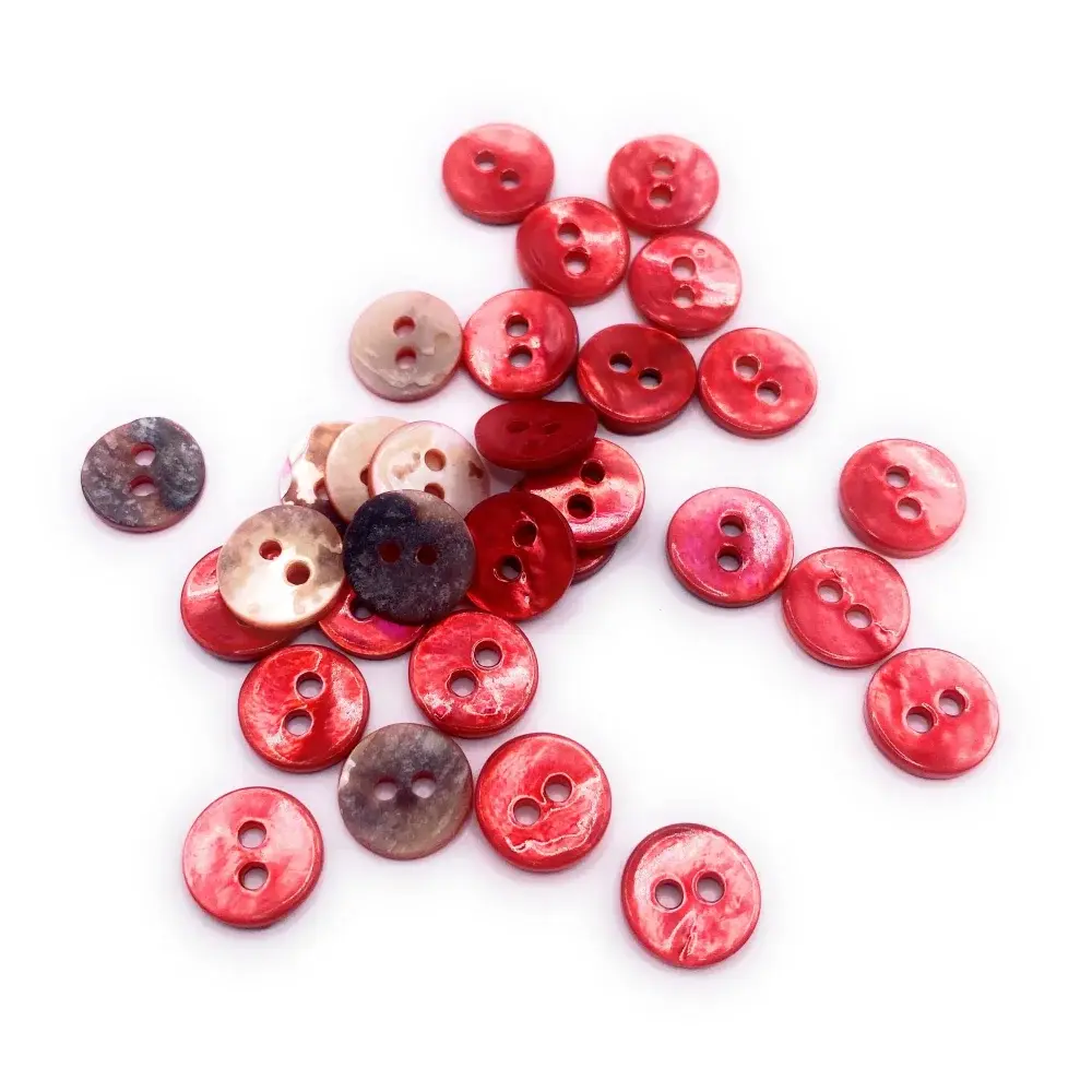 Pile of colorful, two-hole buttons.