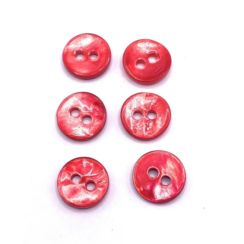 Six red two-hole buttons.