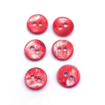 Six red two-hole buttons.