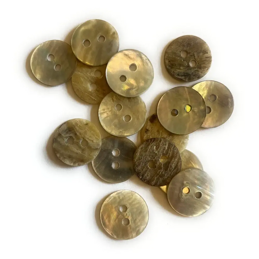 Pile of iridescent two-hole buttons.